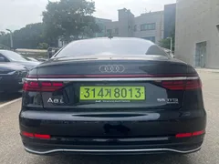2023 Audi A8 55 TFSI Quattro Premium LWB, чёрный — фото 4
