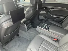 2023 Audi A8 55 TFSI Quattro Premium LWB, чёрный — фото 7