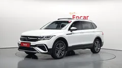 2023 Volkswagen Tiguan 2.0 TSI Prestige, белый — фото 1