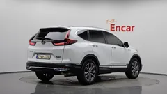 2021 Honda CR-V 2.0 Hybrid Touring 4WD, белый — фото 2
