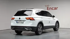 2023 Volkswagen Tiguan 2.0 TSI Prestige, белый — фото 2