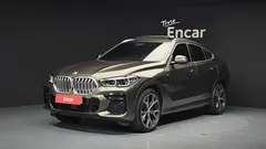 2022 BMW X6 xDrive40i M Sport, коричневый — фото 1