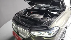 2022 BMW X6 xDrive40i M Sport, коричневый — фото 6
