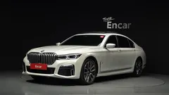 2021 BMW 7-Series 730Ld xDrive M Sport, белый — фото 1