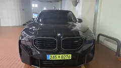 2023 BMW XM 4.4, чёрный — фото 9
