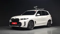 2024 BMW X5 xDrive 50e M Sport, белый — фото 1