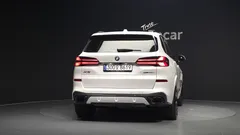 2024 BMW X5 xDrive 50e M Sport, белый — фото 4
