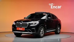 2023 BMW X4 xDrive20i xLine, чёрный — фото 1