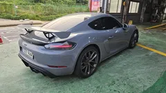 2023 Porsche 718 4.0 GT4, серый — фото 5