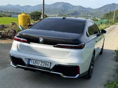 2023 BMW 7-Series 740i xDrive M Sport, белый — фото 5