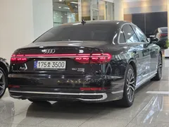 2023 Audi A8 60 TFSI Quattro LWB, чёрный — фото 2