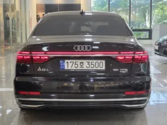 2023 Audi A8 60 TFSI Quattro LWB, чёрный — фото 4