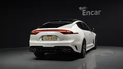 2023 Kia Stinger 2.5 Masters, белый — фото 4