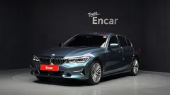 2021 BMW 3-Series 320i Luxury, 청옥색 — фото 1