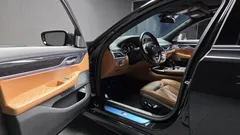 2022 BMW 7-Series 740i M Sport, чёрный — фото 10