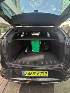 2023 BMW XM 4.4, чёрный — фото 8