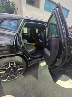 2023 BMW XM 4.4, чёрный — фото 16