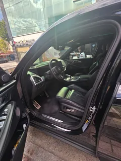2023 BMW XM 4.4, чёрный — фото 18