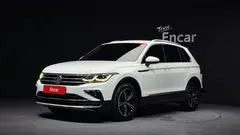 2021 Volkswagen Tiguan 2.0 TDI Premium, белый — фото 1