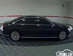 2021 Audi A8 55 TFSI Quattro Premium LWB, чёрный — фото 3