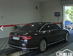 2021 Audi A8 55 TFSI Quattro Premium LWB, чёрный — фото 4