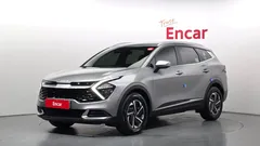 2023 Kia Sportage Prestige, серо-серебристый — фото 1