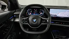 2024 BMW 5-Series 520i, чёрный — фото 17