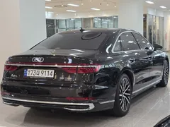 2023 Audi A8 60 TFSI Quattro LWB, чёрный — фото 2