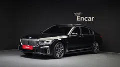 2022 BMW 7-Series 745Le iPerformance M Sport, чёрный — фото 1