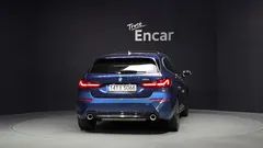 2022 BMW 1-Series 120i Sports, синий — фото 4