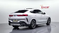 2023 BMW X6 xDrive40i M Sport, белый — фото 2
