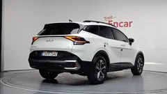 2023 Kia Sportage Signature Gravity 2WD, белый — фото 2
