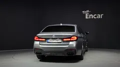 2023 BMW 5-Series M550i xDrive — фото 4