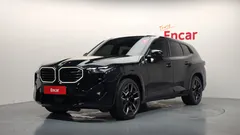 2023 BMW XM 4.4, чёрный — фото 1