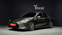 2023 Toyota Camry 2.5 XLE Hybrid, 연금색 — фото 1
