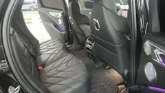 2023 BMW XM 4.4, чёрный — фото 17