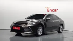 2022 Toyota Camry 2.5 LE Hybrid, коричневый — фото 1