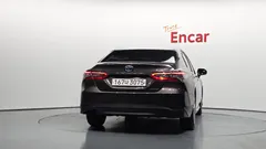 2022 Toyota Camry 2.5 LE Hybrid, коричневый — фото 4