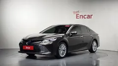 2021 Toyota Camry 2.5 XLE Hybrid, коричневый — фото 13