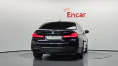 2022 BMW 5-Series M550i xDrive — фото 4