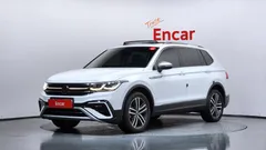 2023 Volkswagen Tiguan 2.0 TSI Prestige, белый — фото 1