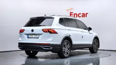 2023 Volkswagen Tiguan 2.0 TSI Prestige, белый — фото 2