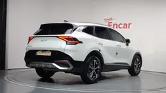 2024 Kia Sportage Signature 2WD, белый — фото 2