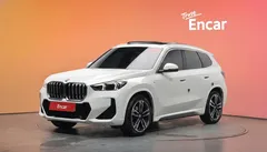 2024 BMW X1 xDrive 20i M Sport, белый — фото 1
