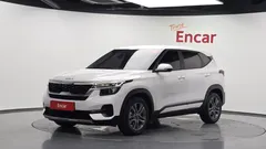 2023 Kia Seltos Gasoline 1.6 Turbo 4WD, белый — фото 1