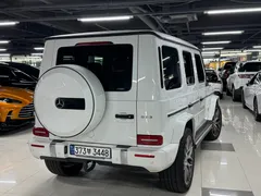 2023 Mercedes-Benz G-Class AMG G63 Manufaktur, белый — фото 3