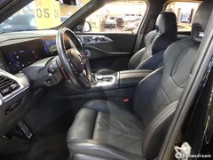 2023 BMW XM 4.4, чёрный — фото 10