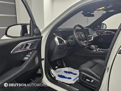 2023 BMW XM 4.4, белый — фото 16