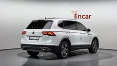2023 Volkswagen Tiguan 2.0 TSI Prestige, белый — фото 2