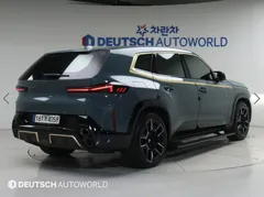 2023 BMW XM 4.4, зелёный — фото 2